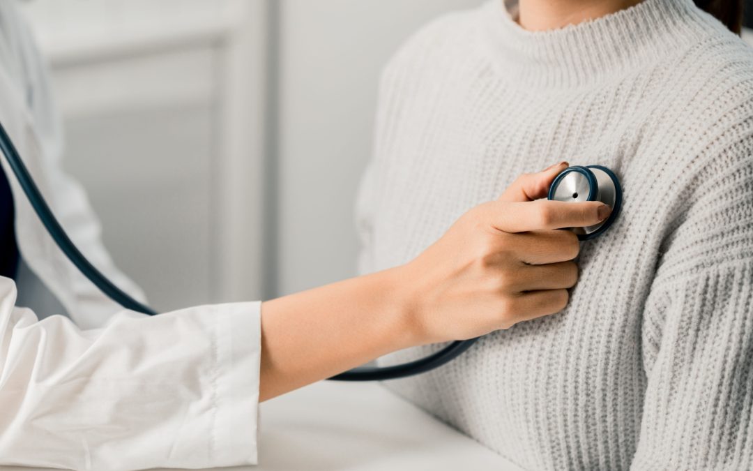 Doctor examining patient