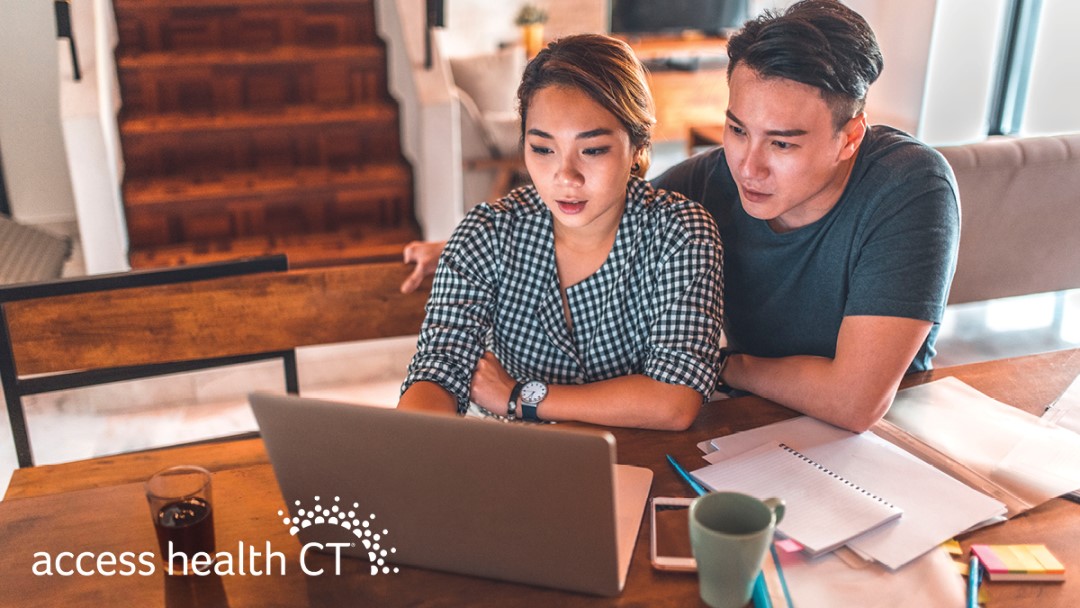 Young couple checking computer